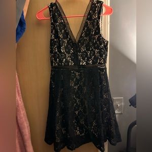 Francesca’s black lace dress
